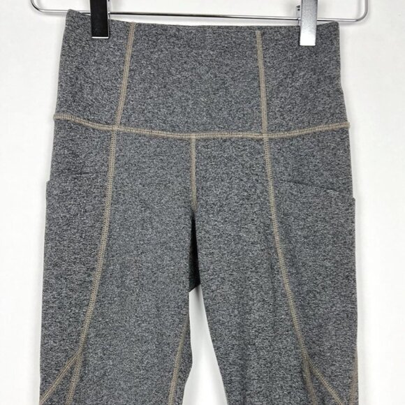 Athleta Salutation Stash Pocket 7/8 Tight in Powervita. Grey Pebble Beach - Picture 2 of 12